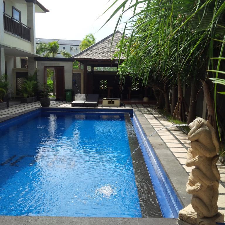 Suji Apartment Bali Номер фото